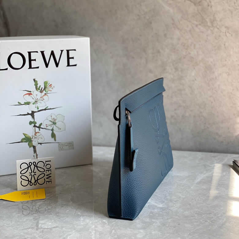 LOEWE羅意威 最新顆粒紋Tpouch繫列手包 0219藍色￥980.00的图片-高仿羅意威包包Loewe