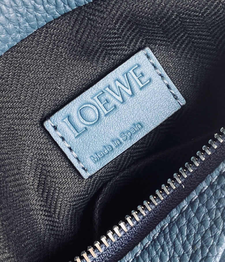 LOEWE羅意威 最新顆粒紋Tpouch繫列手包 0219藍色￥980.00的图片-高仿羅意威包包Loewe