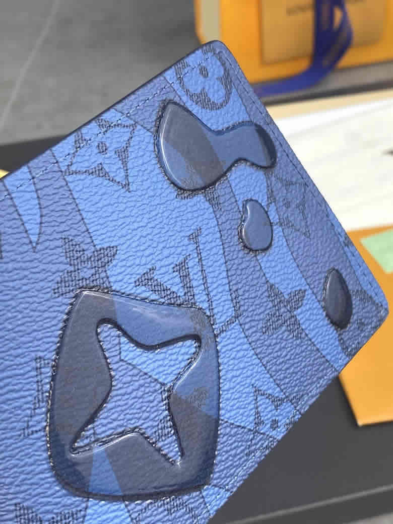 lv新款創意印制工藝Monogram圖案M82307寶藍短夾￥680.00的图片-高仿LV包包、高仿lv錢包