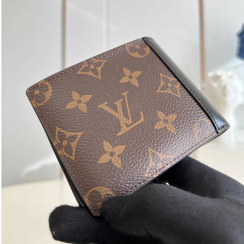 LV/路易威登黑色小牛皮拼老花 短款摺疊 MULTIPLE M69408錢夾￥680.00的图片-高仿LV包包、高仿lv錢包