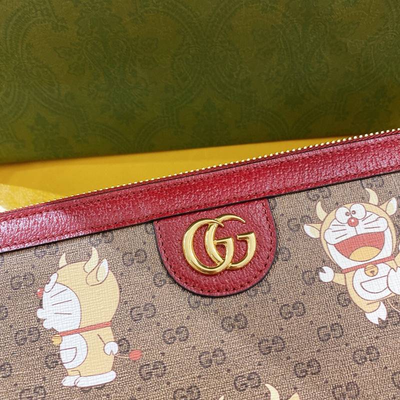 古奇哆啦A夢機器貓男女同款高仿信封包手拿包手包654503￥980.00的图片-高仿古奇包包Gucci、高仿古奇錢包Gucci